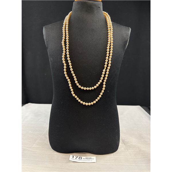 A Huge (50") Long 1950s Faux Pearl Necklace