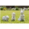 Image 1 : Three White Ceramic Animal Figurines Featuring Rabbits and a Dog