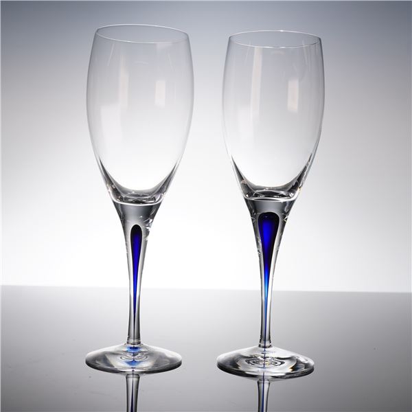 A Pair of Orrefors Intermezzo Blue Crystal Champagne Flutes
