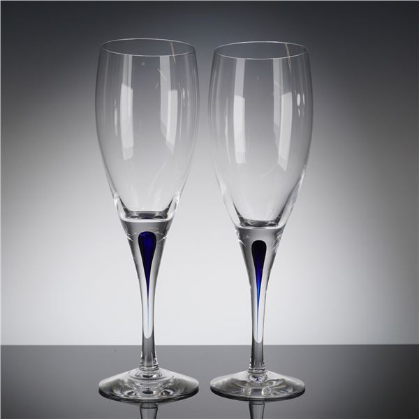 A Pair of Orrefors Intermezzo Blue Crystal Champagne Flutes