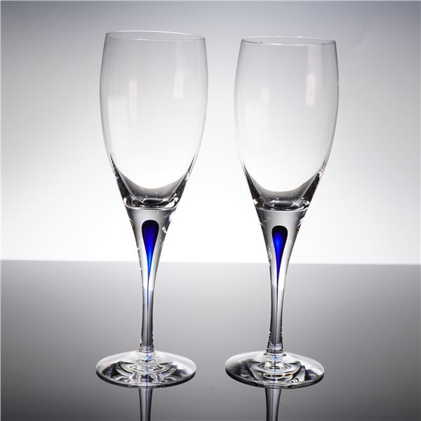 A Pair of Orrefors Intermezzo Blue Crystal Flutes