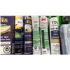 Image 2 : BLUE BIN OF ASSORTED COMMERCIAL MARINE RETAIL PRODUCTS, CHEMICALS, FLASHLIGHTS, & CURRENT GUIDES