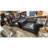Image 1 : PAIR OF BLACK LEATHER MOBILE ARM CHAIRS WITH CHROME ACCENTS