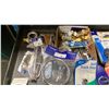 Image 7 : BIN OF ASSORTED MARINE RETAIL PARTS- SPREADER BOOTS, TILLER ROPE GROMMETS, SAILING CLINOMETER,