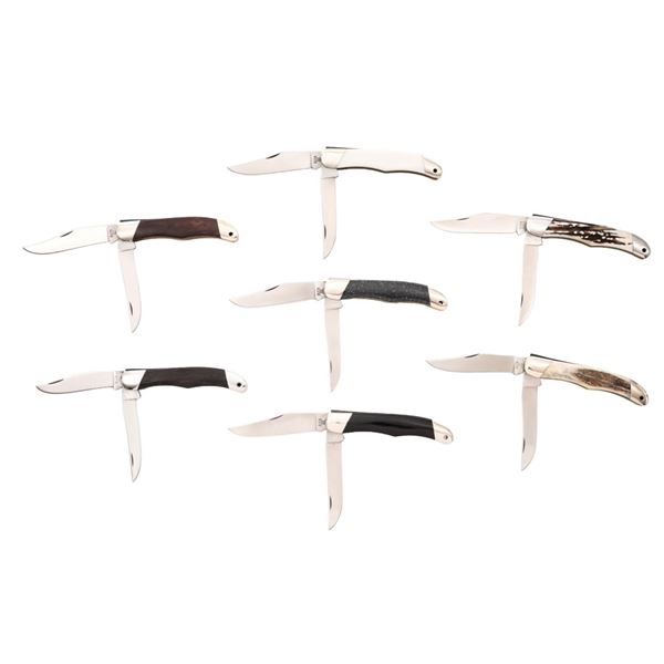 Lot of Seven (7) Custom Handled Buck Model 317 Trailblazer Slipjoint Folding Knives