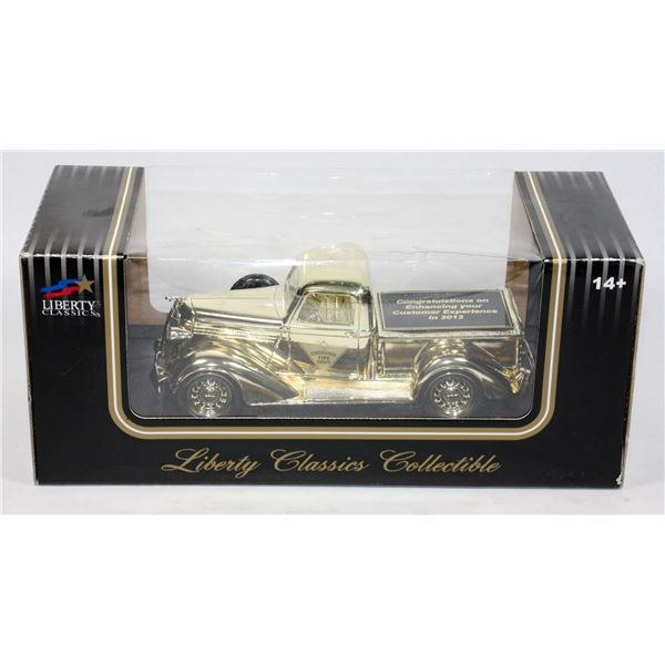 #208 Canada Tire Presentation Gold Dodge Truck