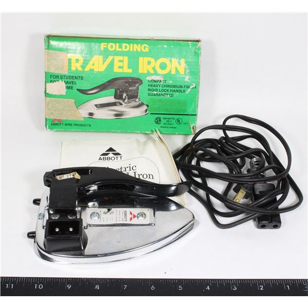 #857 Vintage boxed folding travel iron