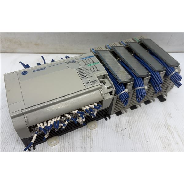 Allen-Bradley #1764-28BXB MicroLogix 1500 w/ #1769-OB16, & (3) #1769-IQ16 Modules