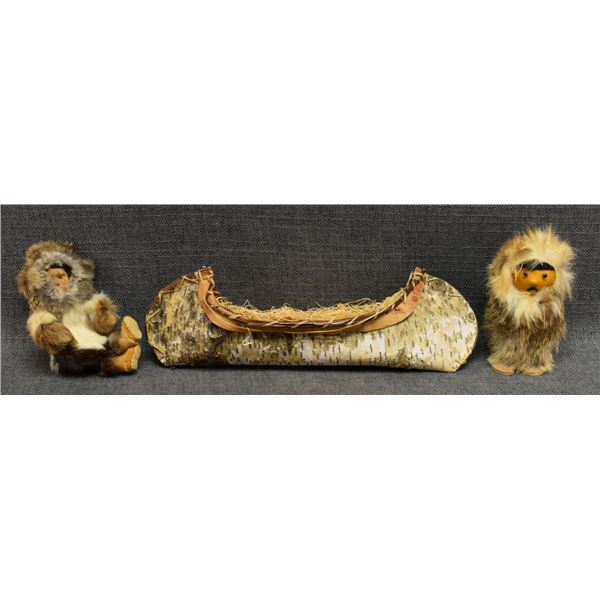 BIRCH BARK CANOE WITH ESKIMO DOLLS