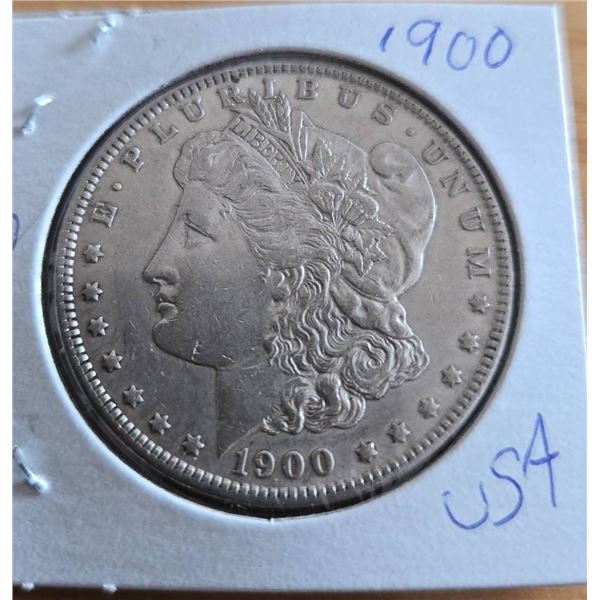 1900 Morgan Silver Dollar in Protective Sleeve