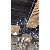 Image 1 : CAREW 21 LIGHT CHANDELIER. HIROSHI GREY APPROX 60"D. RETAIL $6190