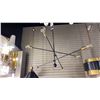 Image 1 : AXLE 6 LIGHT PENDANT. BLACK AND BRASS. 50" ACROSS