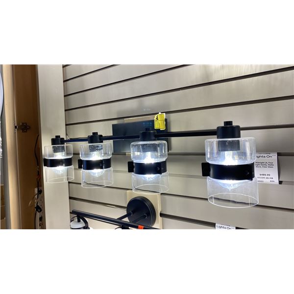 DESIGNERS FOUNTAIN MIDNIGHT LA 3 LIGHT VANITY. MATTE BLACK CLEAR GLASS. 25"