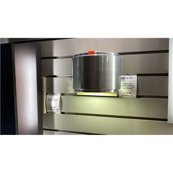 GROUP OF 4 SILVER OUTDOOR WALL SCONCES. RETAIL $900