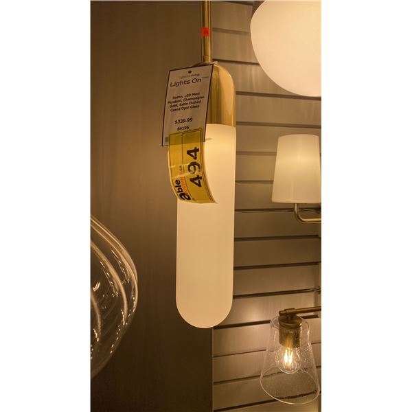 GROUP OF 2 PENDANT LIGHTS. CHAMPAGNE GOLD FINISH, SATIN WHITE ACRYLIC LENSES. RETAIL $800
