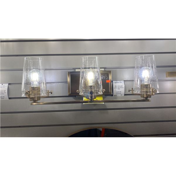 LARGE GROUP LOT OF 13 ASST BATHROOM LIGHTS WITH BRUSHED GOLD FINISHES. RETAIL $4590