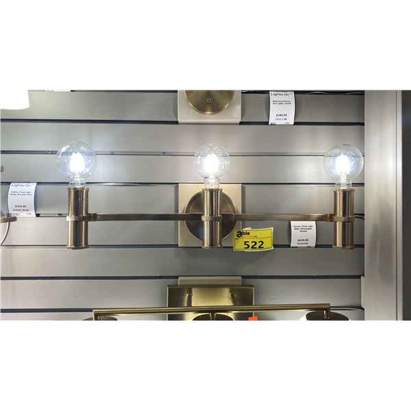 GROUP OF 6 VANITY FIXTURES. ASST STYLES. GOLD/BRASS. RETAIL $2000