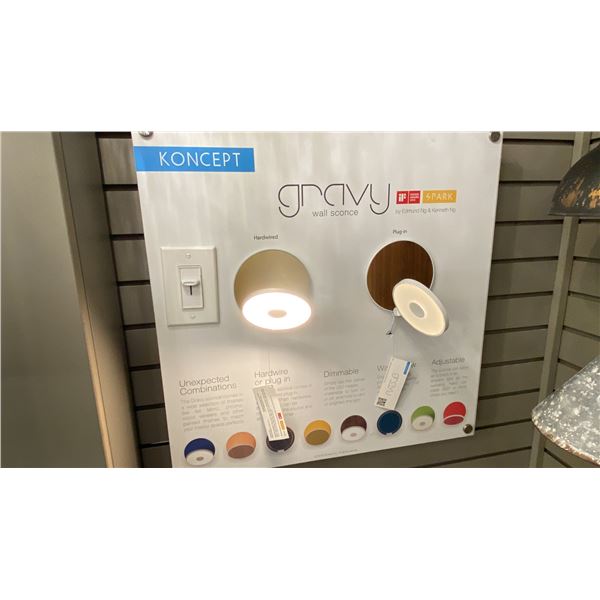 GROUP LOT OF 17 KONCEPT GRAVY WALL SCONCES INC DISPLAY BOARD. RETAIL +$6000.