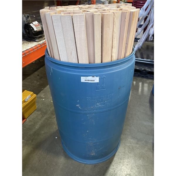 METAL BARRELL FULL OF HEMLOCK WOOD PIECES, 1" X 2" X 43"