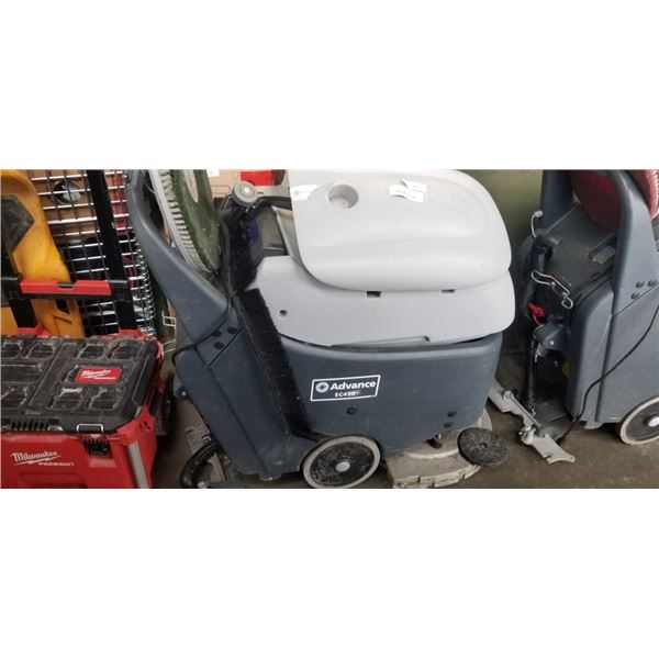 ADVANCE SC450 COMMERCIAL FLOOR CLEANER, BUUILT IN CHARGER, TURNS ON