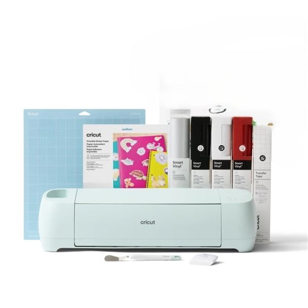 NEW CRICUT MACHINE WITH 4 ROLLS OF VINLY AND STARTER TOOL SET