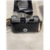 Image 2 : VINTAGE ZENIT EM 35MM CAMERA  AND TRIPOD