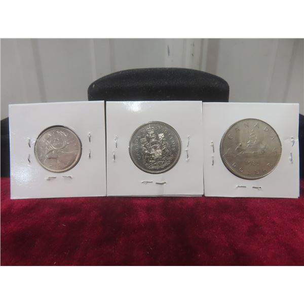 1985 Silver Dollar, 1985 Fifty Cent/Half Dollar, and 1968 Quarter