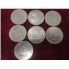 Image 1 : 7 Canadian $1 Coins from the 1970s and 1980s
