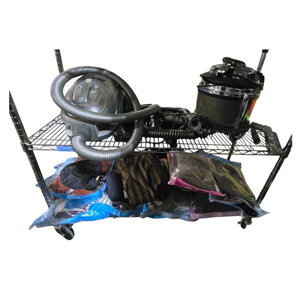 2 Shelves of Misc - Assorted Vacuums & Misc Clothing