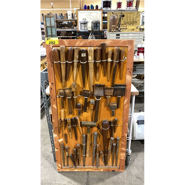 DISPLAY OF COLLECTABLE ANTIQUE NAUTICAL AND WOODWORKING HAND TOOLS PRIMARILY USED FOR BOATBUILDING