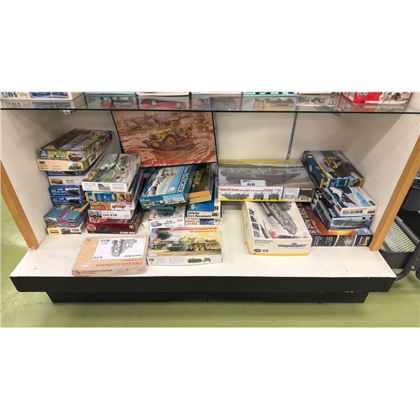 SHELF OF ASSORTED MODEL VEHICLE KITS INCLUDING; CRUISER BLUCHER, BATTLE SHIP USS MASSACHUSETTES &