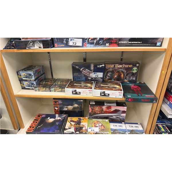 SHELF OF ASSORTED MODEL KITS INCLUDING; THE STRANGE CHANGING TIME MACHINE, NUCLEAR POWERED