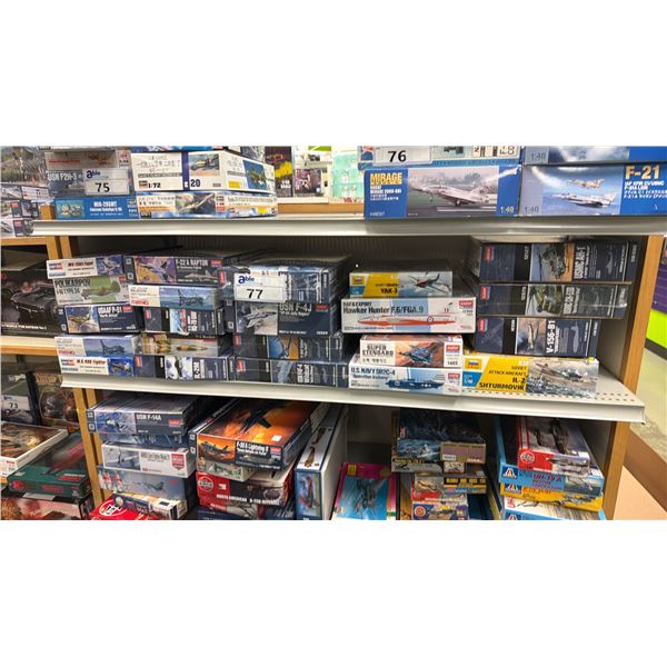 SHELF OF ASSORTED MODEL KITS INCLUDING; HAWKER HUNTER F.6/FGA.9, USN F-4J VF-84 JOLLY ROGERS, M.S.
