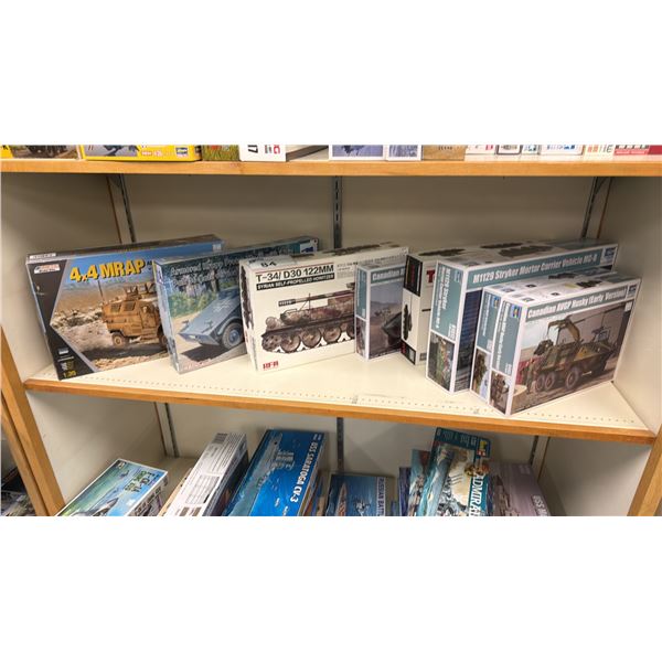 SHELF OF ASSORTED MODEL KITS INCLUDING; 4X4 MRAP, T-34/D30 122MM, M1129 STRYKER MORTAR CARRIER