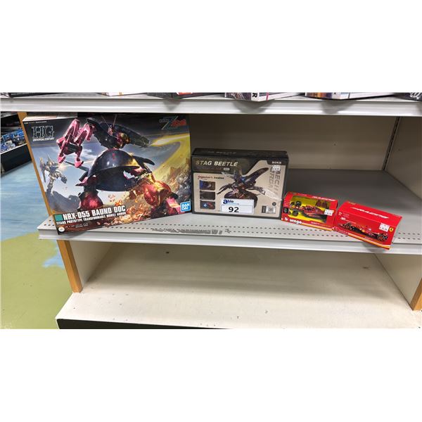 SHELF OF ASSORTED MODEL KITS INCLUDING; BANDAI HG NRX-055 BAUND DOC TITANS PROTOTYPE TRANSFORMABLE