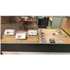 Image 1 : CONTENTS OF SHOWCASE INCLUDING; HOBBYWING QUICRUN 2435 BRUSHLESS MOTORS, TRAXXAS TITAN 180M R/C