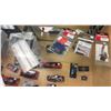 Image 6 : CONTENTS OF SHOWCASE INCLUDING; GENS ACO 2200 111V BATTERIES, TRAXXAS POWER CELL BATTERIES, SKYRC