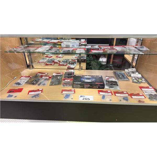 CONTENTS OF SHOWCASE INCLUDING; TRAXXAS MINIMAXX HIGH INTENSITY MINIMAXX OFF-ROAD LIGHT KIT,