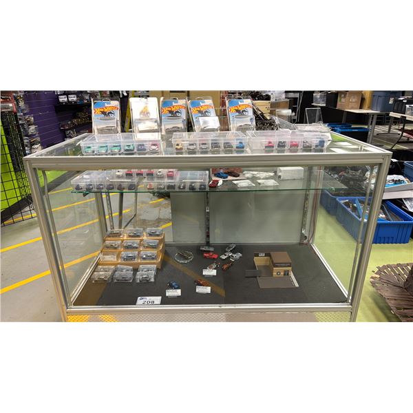 CONTENTS OF SHOWCASE INCLUDING; HOT WHEELS CARS, FLORIDA HIGHWAY PATROL MINIATURE BUILDING & MORE