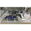 Image 2 : CONTENTS OF SHOWCASE INCLUDING; MODEL CARS, MODEL GUNDAM, REFLECTIVE DISPLAY TRAYS & MORE