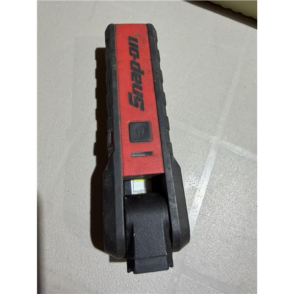 Snap on flashlight magnetic