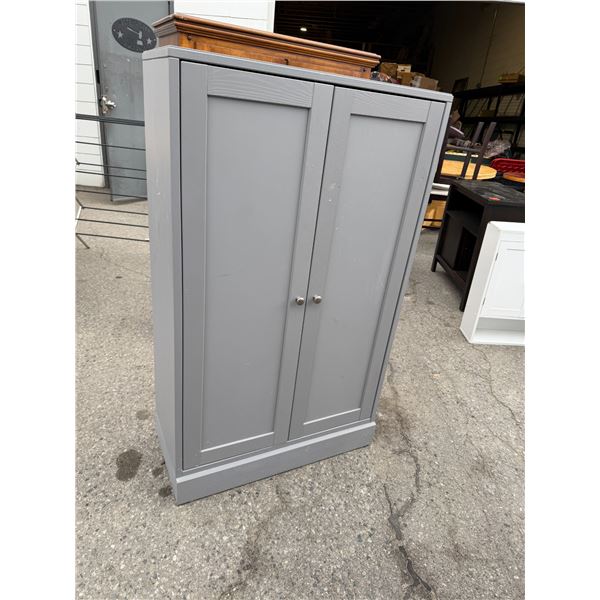 Two door gray shelf measures 32" x 14" x 52 and three-quarter inches