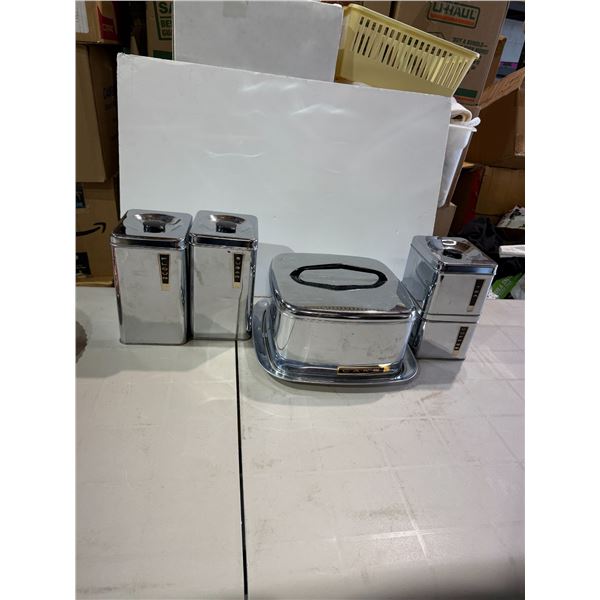 Vintage canisters and cake taker