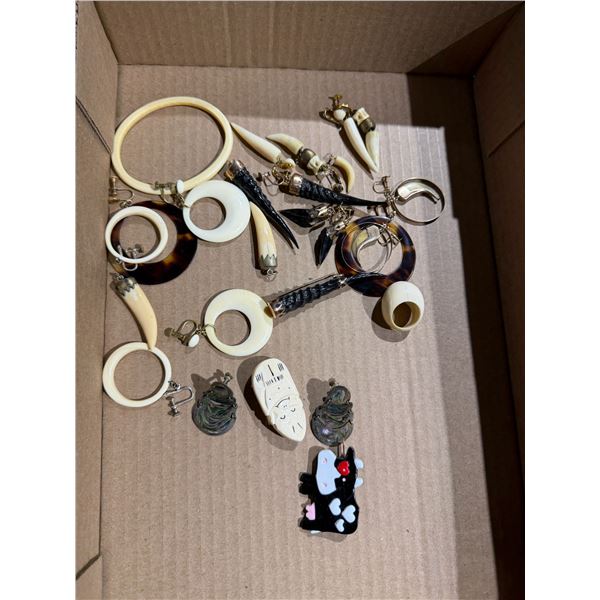 Pendants and brooches and earrings and ring from ESTATE