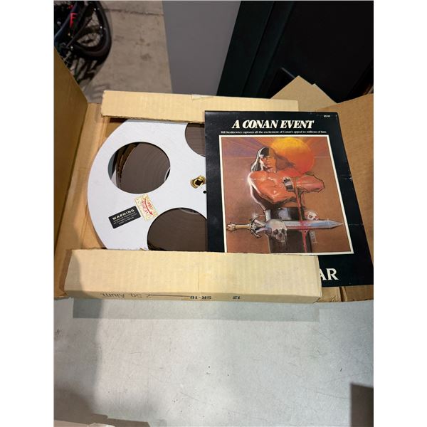 A Conan event magazine, and a movie real