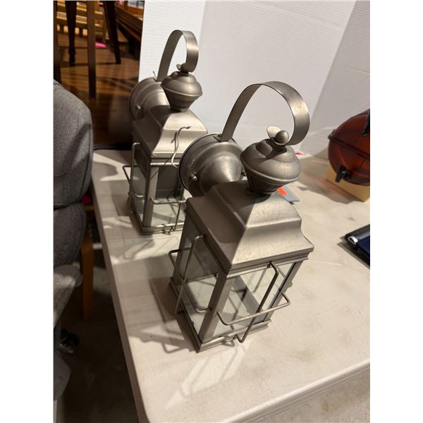 2 outdoor fixtures motion sensored