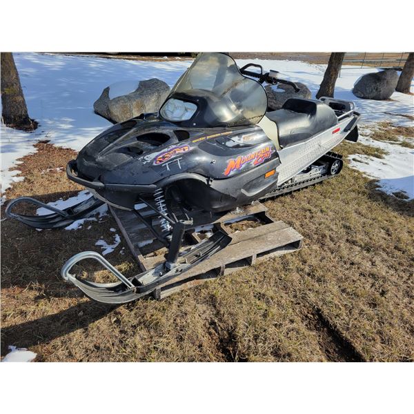 2002 Arctic Cat Mountain Cat 800 EFT, showing 4233 miles, after market cam, 151 inch track, running