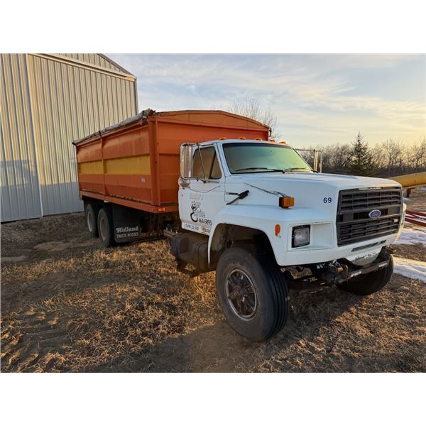 1987 Ford tandem grain truck, 18 ft. x 54 inch H steel box, single cyl. hoist, showing 213,232 km, 6