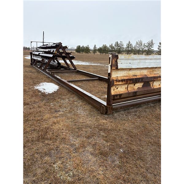 Approx. 8 ft. x 46 ft. steel skid c/w qty of steel- 6 inch, 7 inch, 8 inch & 10 inch x 14 to 20 ft.