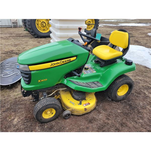 JD X300 42 inch Hydrostatic drive riding mower, showing 512 hrs. c/w new seat, new belt & new blade,